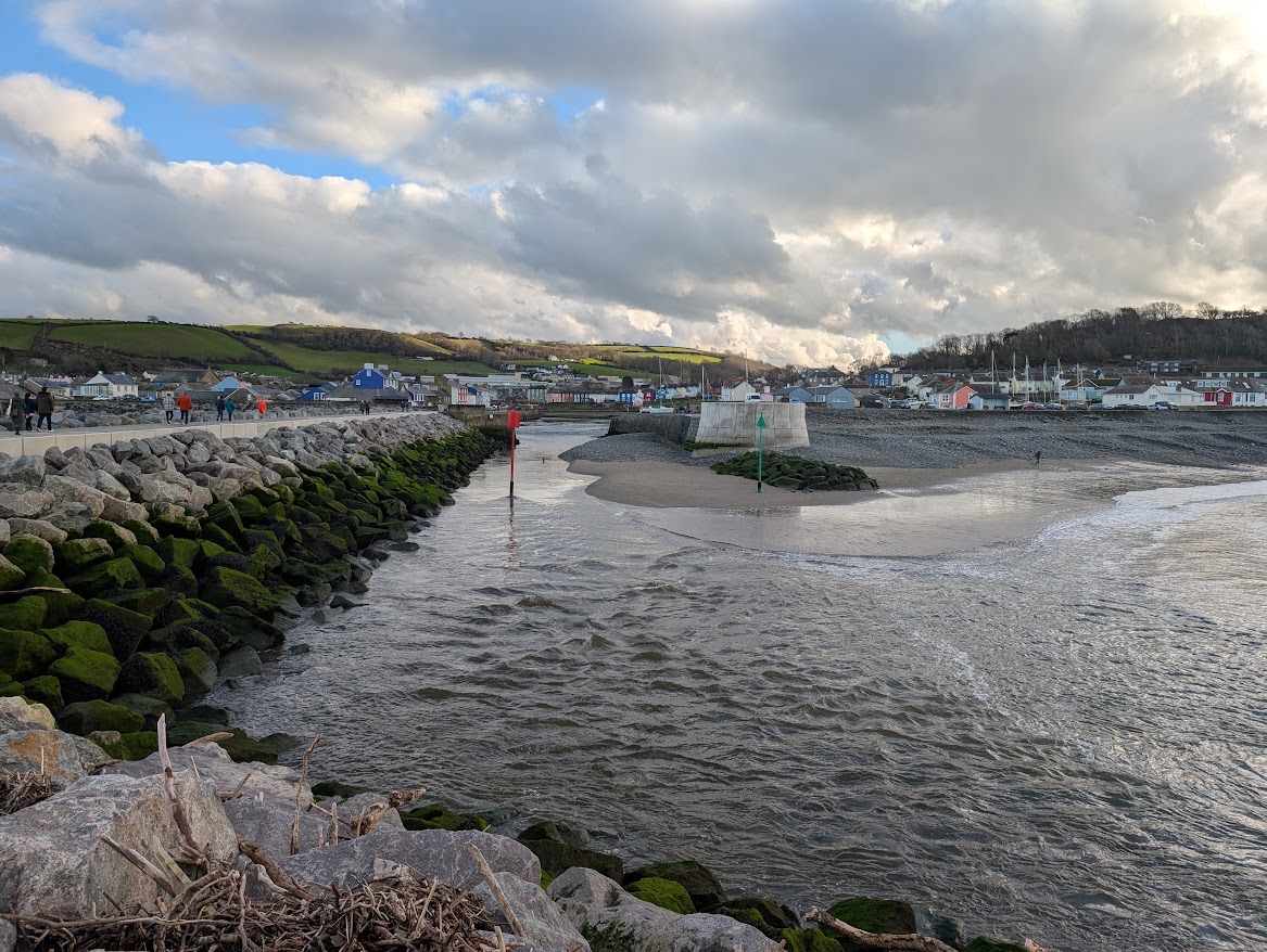 The harbour entrance is blocked by a large sand bank which stretches over halfway across the navigation channel
