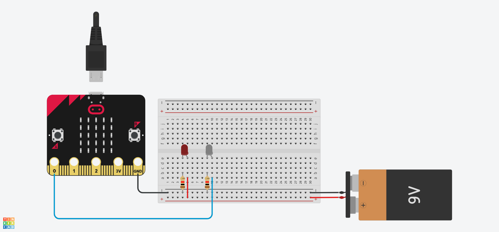 Cylched Tinkercad sy'n dangos bod y wifren sy'n cysylltu pin 3V y Micro:Bit i'r bwrdd bara wedi'i thynnu. Ychwanegwyd batri 9V, gyda'r terfynellau wedi'u cysylltu i reilen gyfatebol y bwrdd bara.