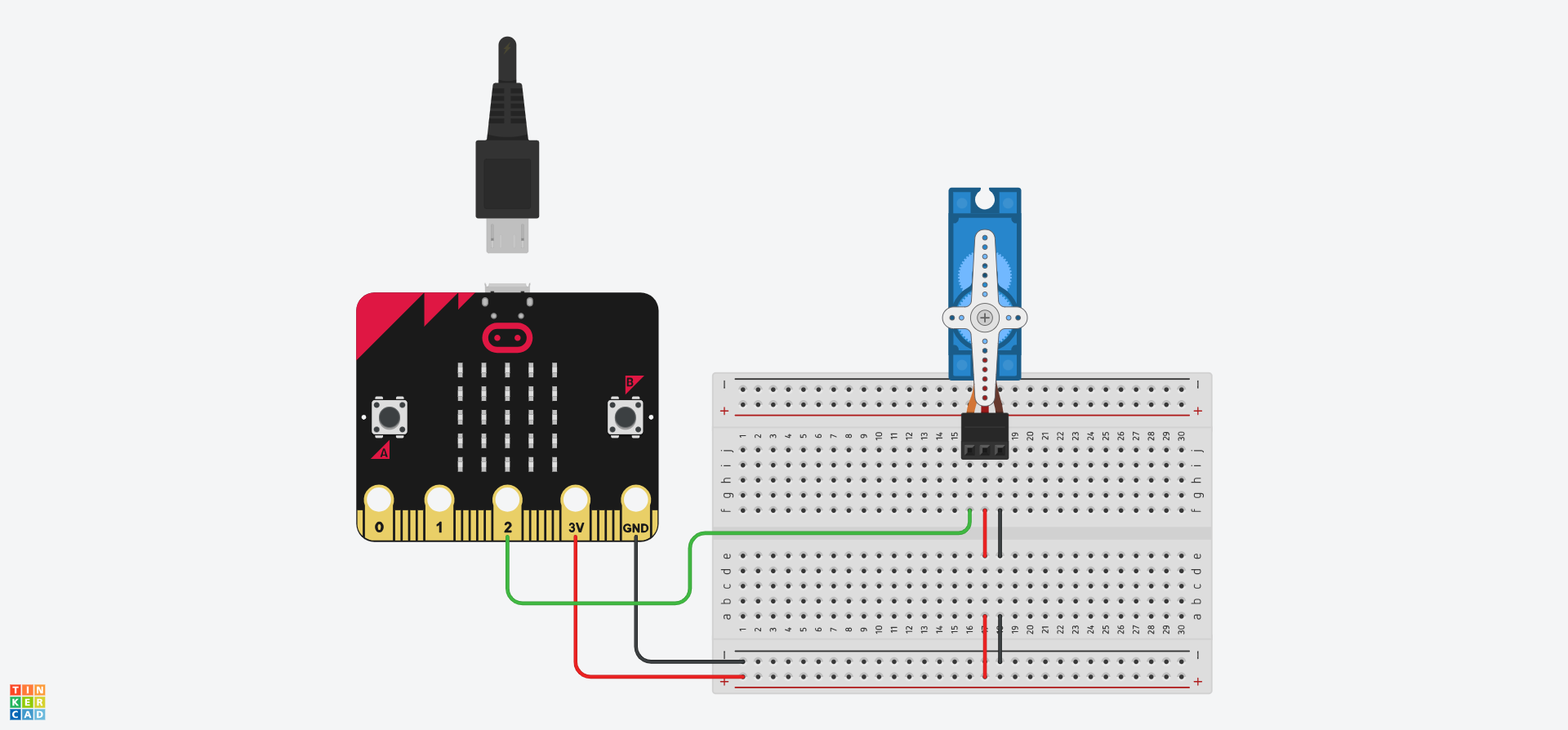 Cylched Tinkercad yn dangos Micro:Bit wedi'i gysylltu â bwrdd bara i ddarparu pŵer. Mae servo wedi'i gysylltu i dyllau j16, j17, a j18. Mae gwifren yn cysylltu twll f16 yn uniongyrchol i bin 2 y Micro:Bit. Mae gwifrau hefyd yn cysylltu'r wifren bositif i f17 a'r rheilen negyddol i f18.
