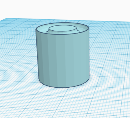 a pale blue cylinder with a curve-based ring cut from one of the circular surfaces