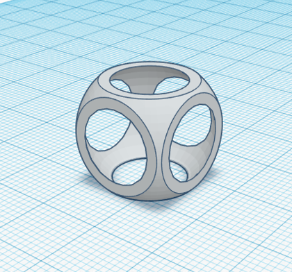 A white curved cube hollowed out with circular openings on each of its sides