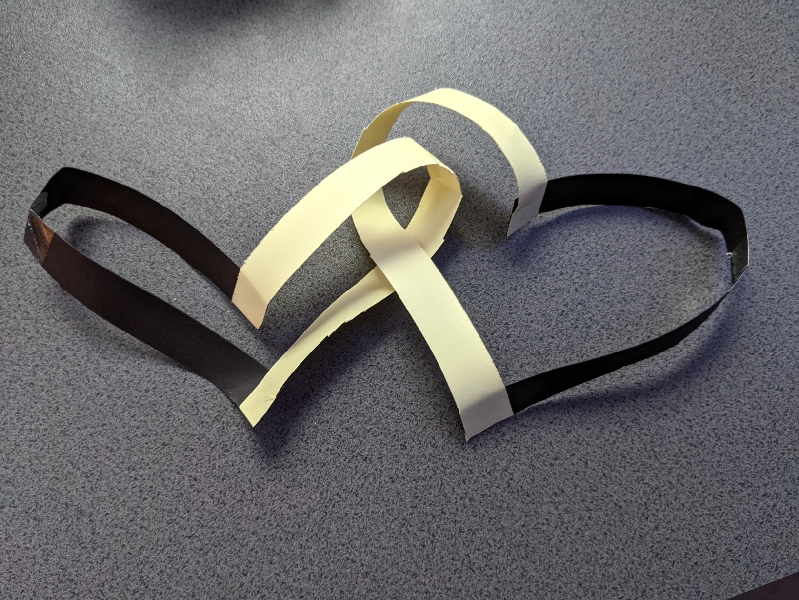 Two interlinked hearts produced by following this challenge's instructions.