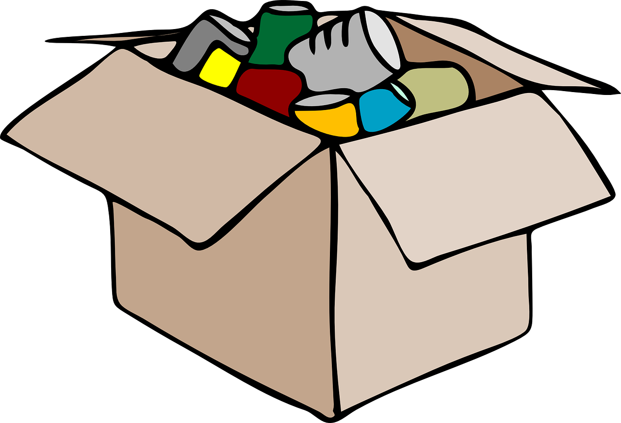 A box filled to overflowing with random items
