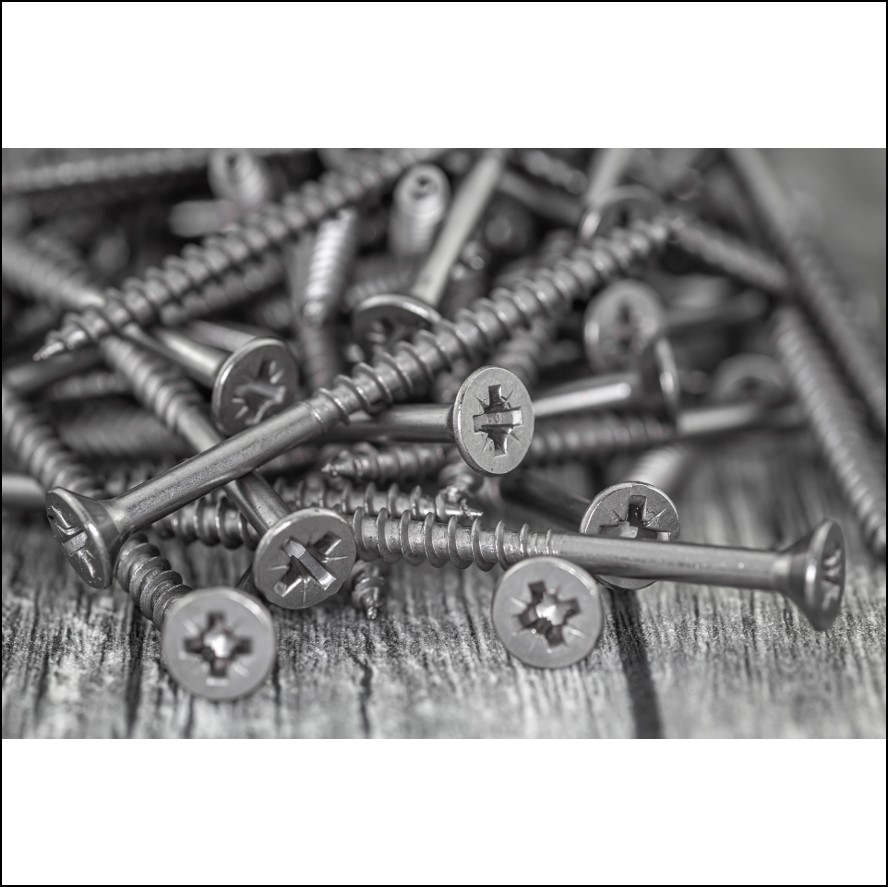 a pile of stainless steel screws