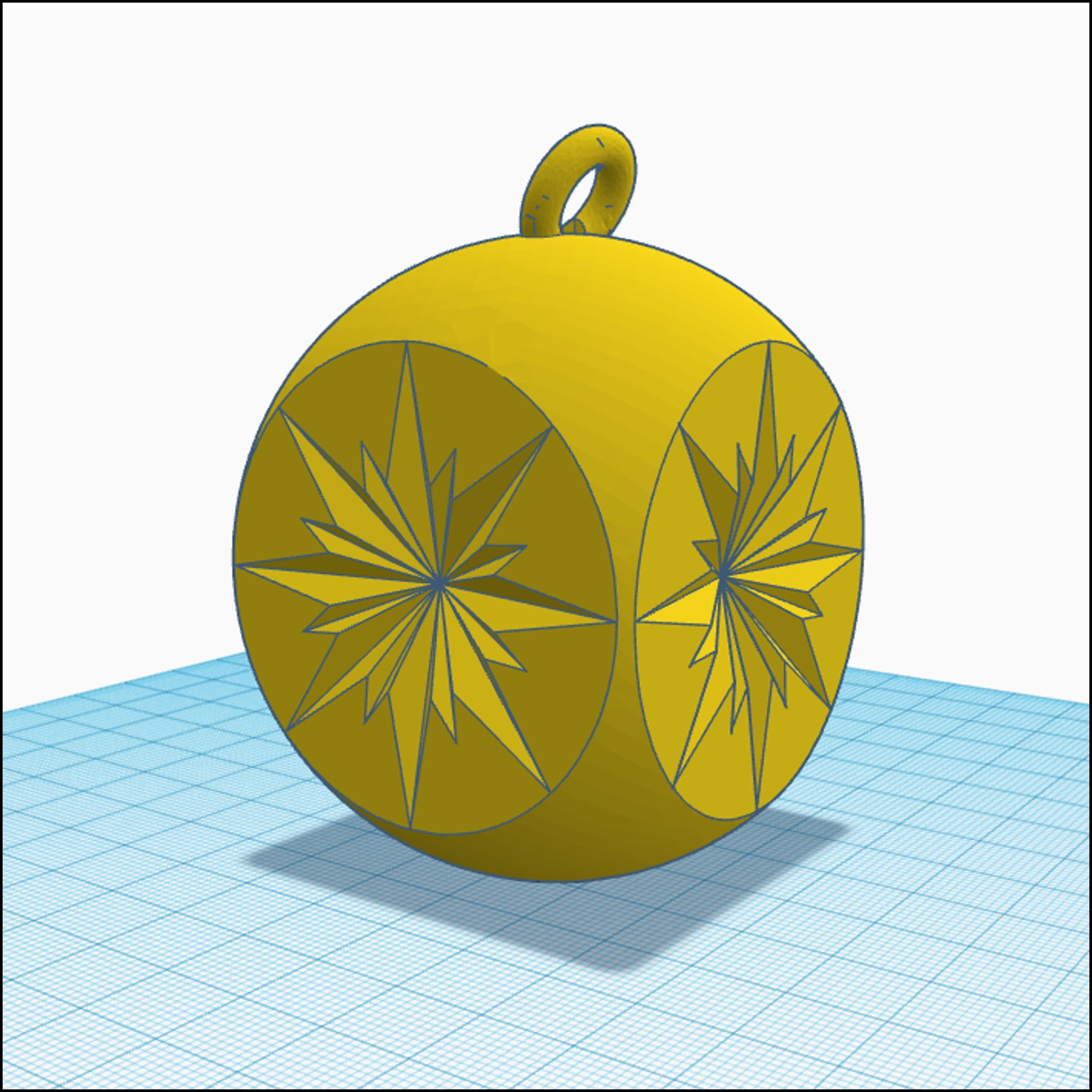 Addurn ciwb gydag ochr crwm gyda sêr wedi'u hysgythru ar bob ochr.